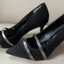 Black high heeled shoe with silver detail front Image 2