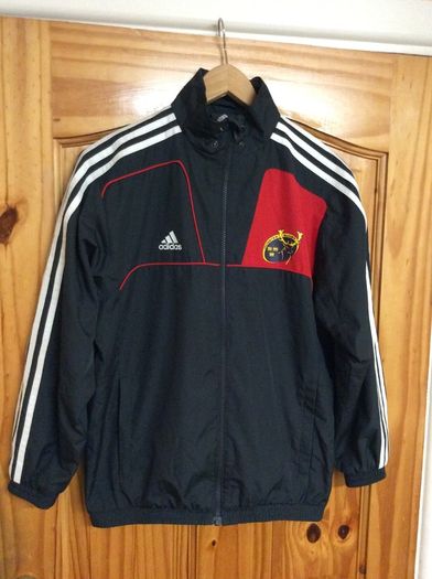 Munster Rugby. Official Adidas Youths Age 11-12 Years Track Jacket.Touchline Jacket. Bench Jacket. Collect In Dublin Or Receive Via Post.