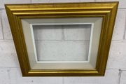 A very nice gold frame and glazed