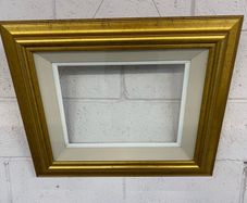 A very nice gold frame and glazed