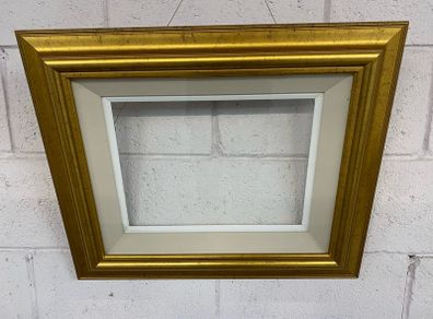 A very nice gold frame and glazed