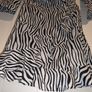 Perfect for Summer. black Zebra Print Wrap Tea Dress from Pretty Little Thing Image 6
