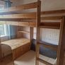 High-rise bed with desk and sofa Image 4