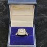 Sterling silver 925 halo engagement ring with square cubic zirconia and side stones Image 3