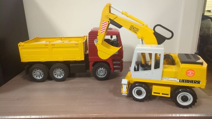 Bruder MAN TGA Construction Truck with Liebherr Excavator set in a 1:16 scale