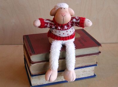 Christmas lamb sits on shelf