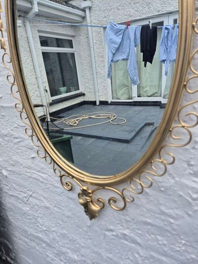 A Mirror Large heavy Vintage Rococo design filly bevelled oval Mirror