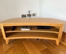 Contemporary curved oak finish TV stand