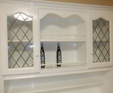 White painted kitchen dresser with glass display cabinets