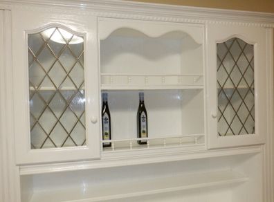 White painted kitchen dresser with glass display cabinets