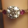 Moissanite Solitaire Ring with Natural Ruby Accents Image 4