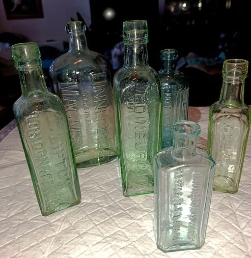 Old green bottles Lipton and others