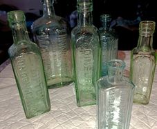 Old green bottles Lipton and others