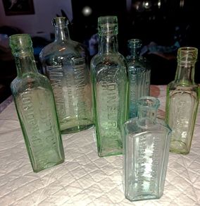 Old green bottles Lipton and others