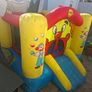 Happy Hop clown-themed bouncy castle with blower Image 3