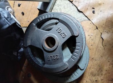 weight 4x 10kg Olympic plates like new