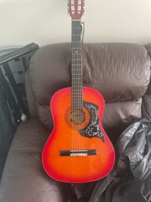 acoustic guitar with case and strap