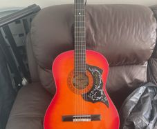 acoustic guitar with case and strap
