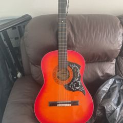 acoustic guitar with case and strap