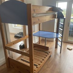 bed with desk and small pullout bed for kid underneath