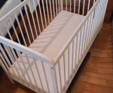 White wooden Cot