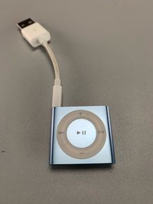 Apple iPod Shuffle 4th Generation, a small, portable MP3 player