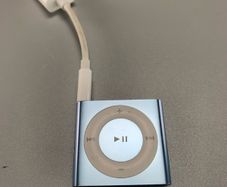 Apple iPod Shuffle 4th Generation, a small, portable MP3 player