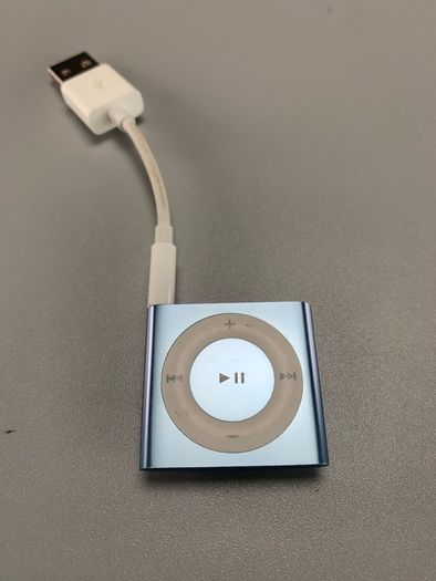 Apple iPod Shuffle 4th Generation, a small, portable MP3 player