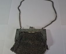 German silver chainmail mesh purse with floral clasp and chain strap