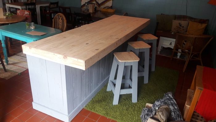 Rustic kitchen island with overhang