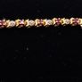 9ct yellow gold diamond and ruby bracelet Image 4
