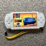 Modded Sony White PSP 1000 with Over 100 Games with Case and Charger. Image 8