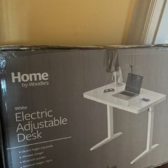 Electric adjustable desk