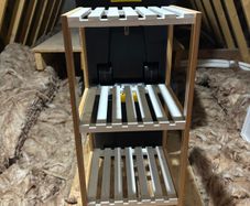 white and wood bathroom shelves