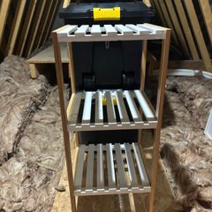 white and wood bathroom shelves