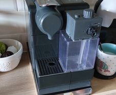 DeLonghi Nespresso machine with milk frother for old pods