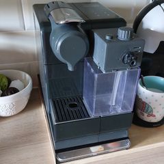 DeLonghi Nespresso machine with milk frother for old pods