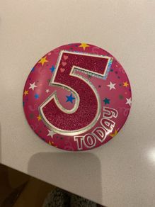 Birthday badge and candle girl age 5