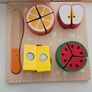Wooden vegetables and cake Image 9
