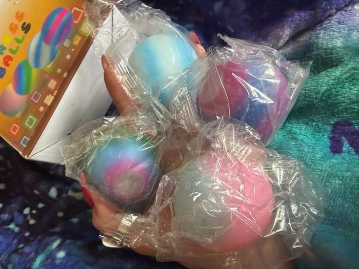 Brand new boxed stress balls x 4