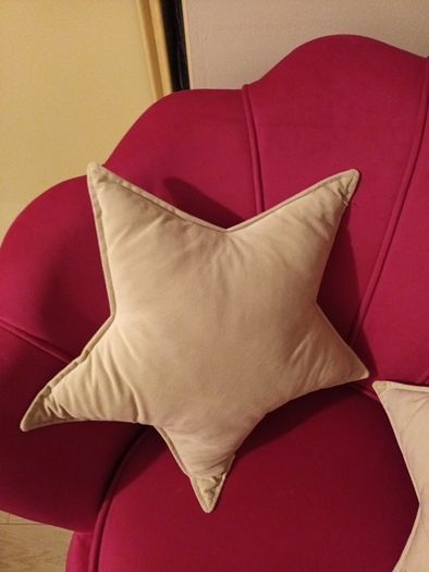 2 cream star shaped velvet cushions