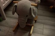 Children rocking elephant