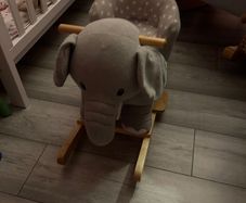 Children rocking elephant
