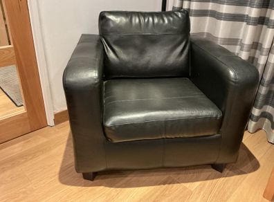 2 Black faux leather armchairs