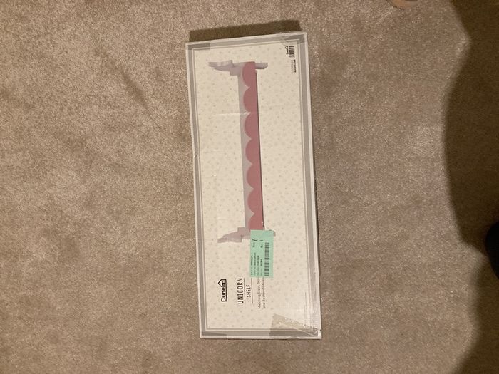Pink and white unicorn shelves x2.