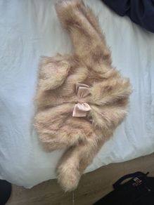 gap girls fur coat. Lovely new and unworn but without tags. Age 12 - 18 mths
