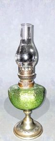Antique green oil lamp