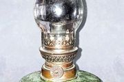 Antique green oil lamp