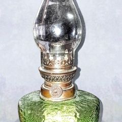 Antique green oil lamp