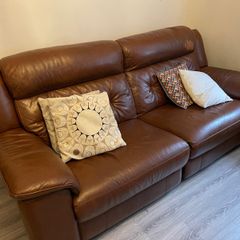 Leather electric recliner sofa with matching armchair and footstool